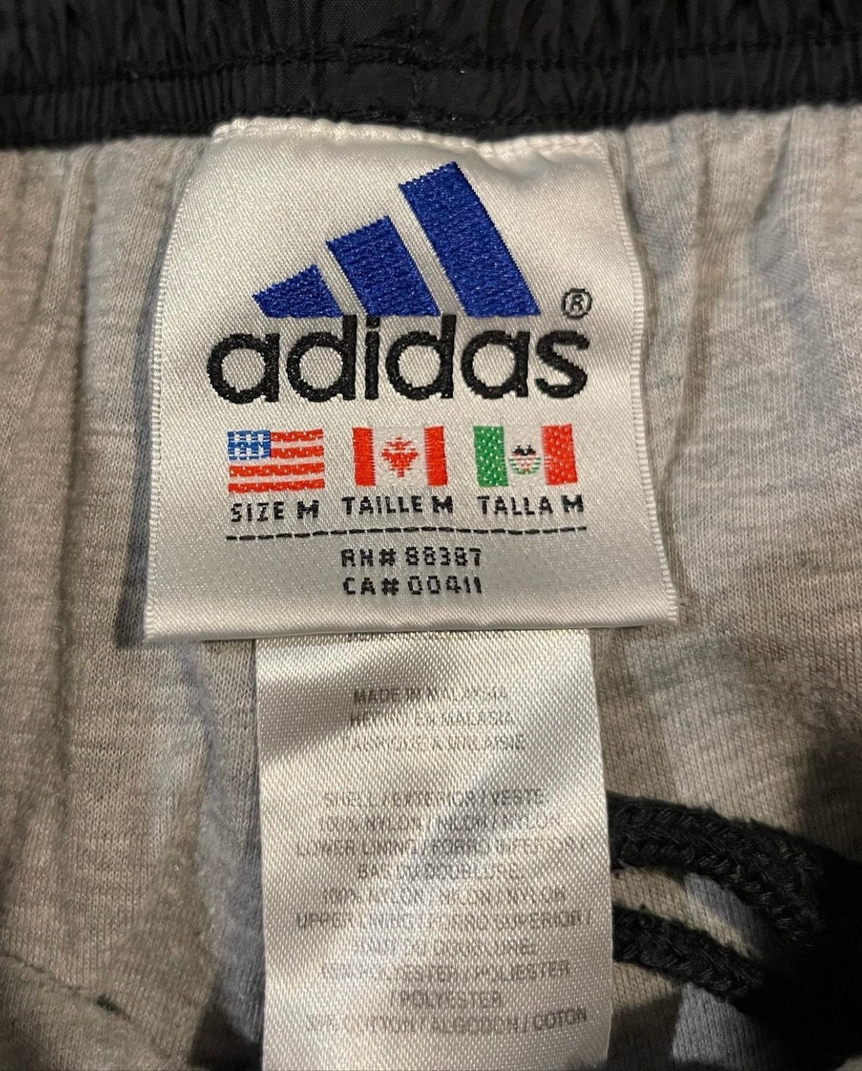 90s Adidas Black and Blue Trackpants (M)